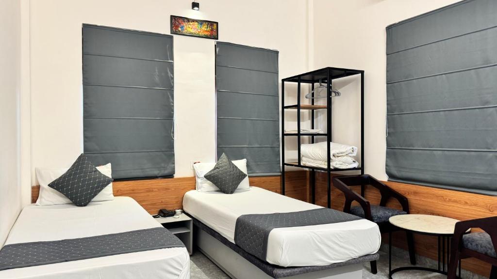 Postel nebo postele na pokoji v ubytování Hotel Insta 18