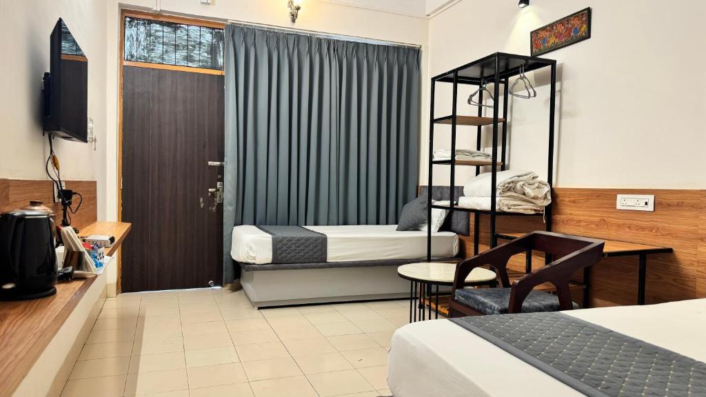 TV a/nebo společenská místnost v ubytování Hotel Insta 18