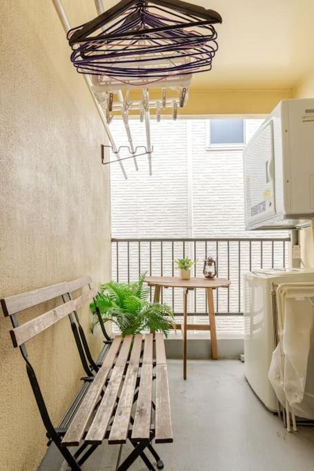 Uma área de estar em Momodani 72 two-story detached house