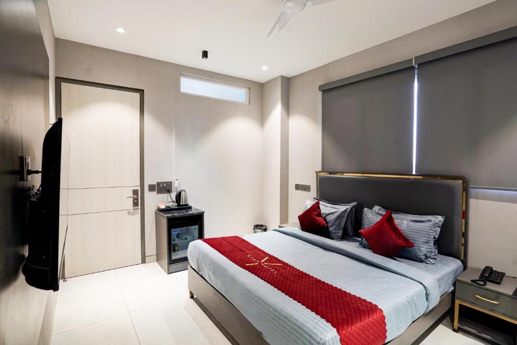 Postel nebo postele na pokoji v ubytování YStay Hotel