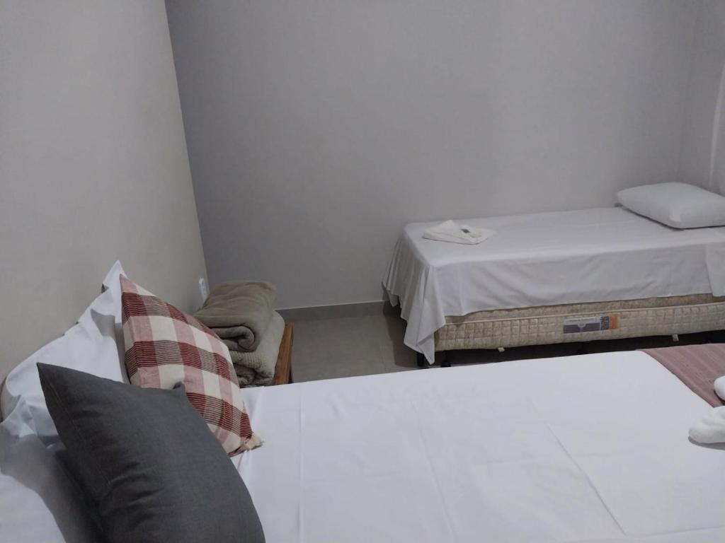 Postel nebo postele na pokoji v ubytování Pousada Ribeirinha