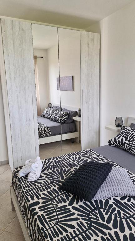 Postel nebo postele na pokoji v ubytování HOUSE MAGIE 2 e 3