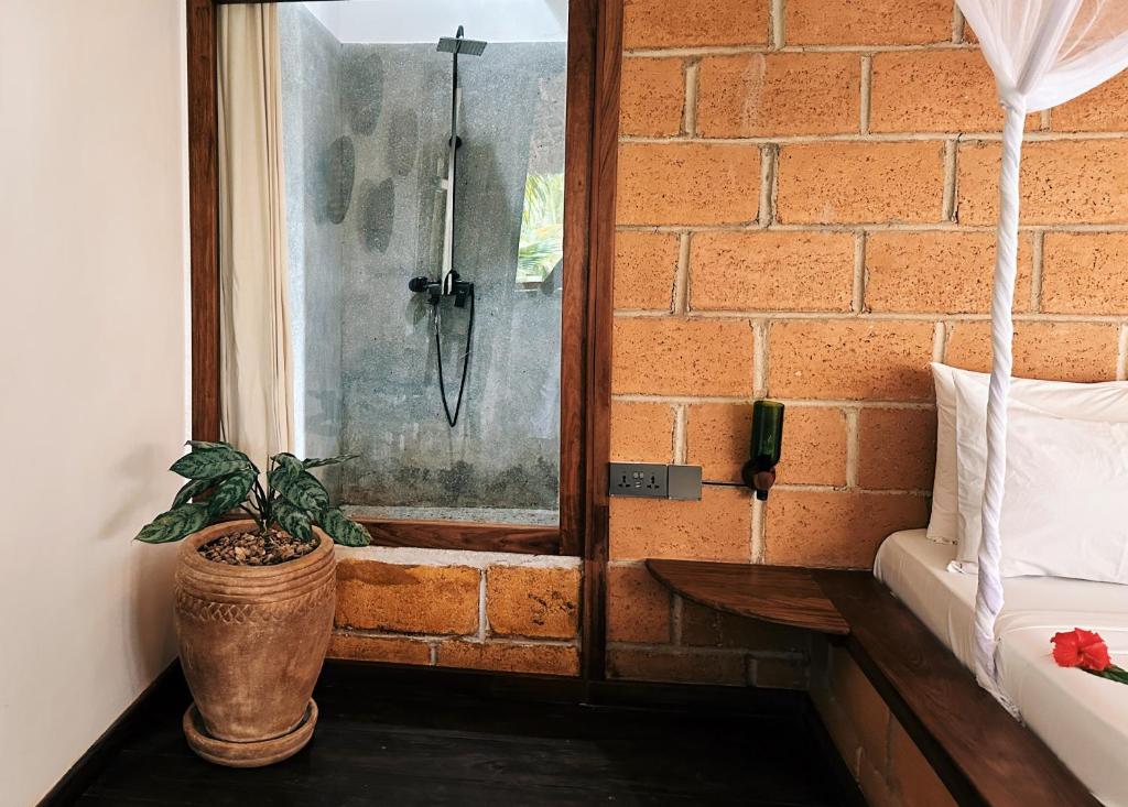 Ein Badezimmer in der Unterkunft Maisha Nungwi - Boutique Hotel