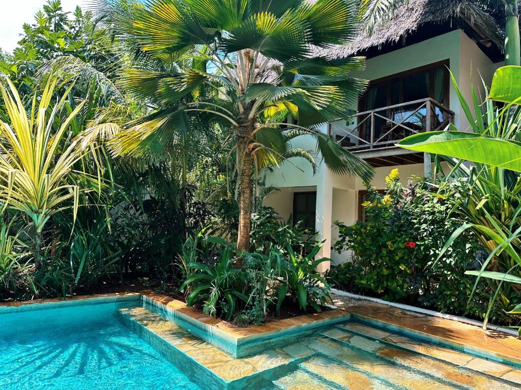 Der Swimmingpool an oder in der Nähe von Maisha Nungwi - Boutique Hotel
