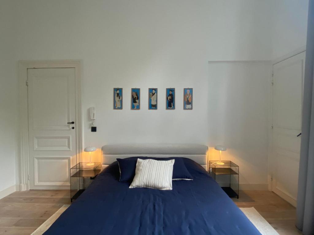Postel nebo postele na pokoji v ubytování Canopée guesthouse