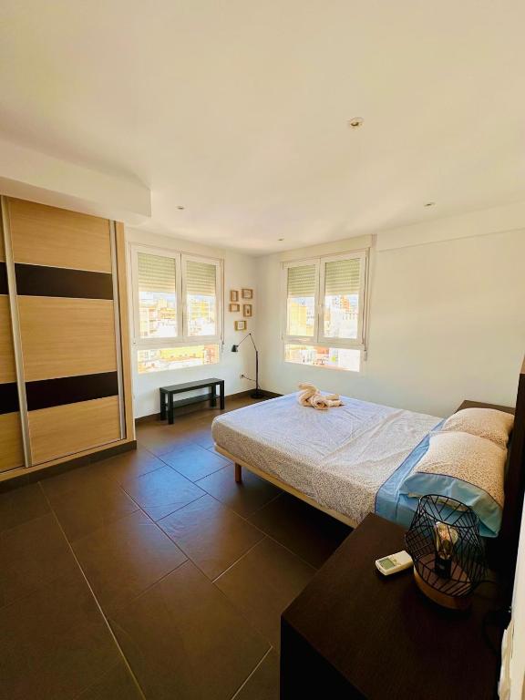 En eller flere senge i et værelse på Caminos del Mediterráneo