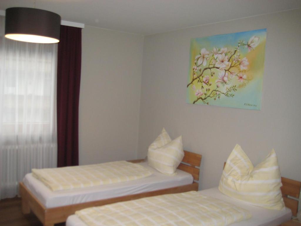 Postel nebo postele na pokoji v ubytování Haus Christl