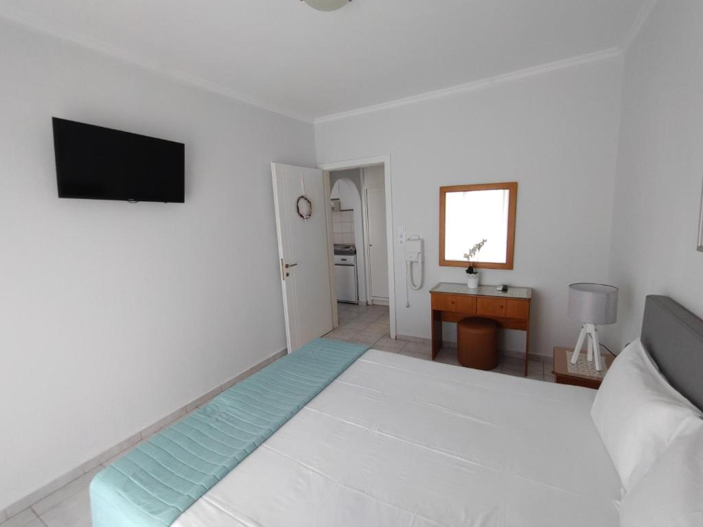 TV a/nebo společenská místnost v ubytování Ioli Apartments