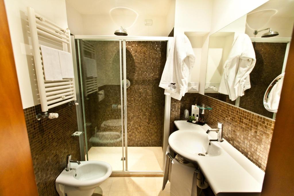 Um banheiro em Dal Moro Gallery Hotel