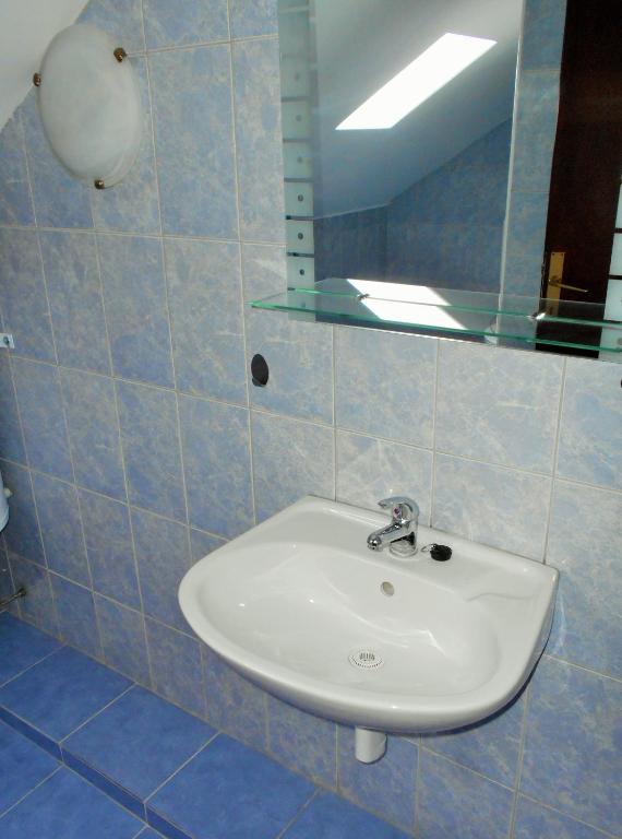 Kúpeľňa v ubytovaní Apartments T&M