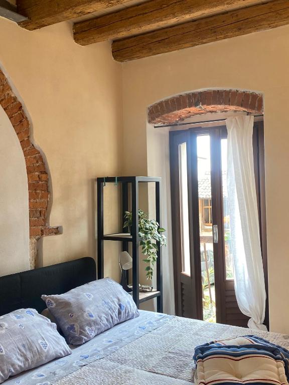 Postel nebo postele na pokoji v ubytování Borgo Antico
