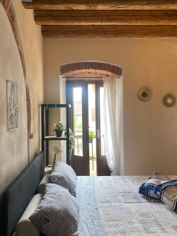 Postel nebo postele na pokoji v ubytování Borgo Antico