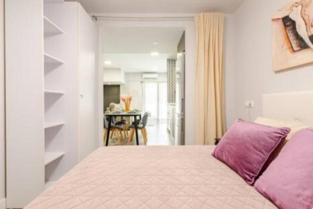 Posteľ alebo postele v izbe v ubytovaní Nuevo loft céntrico parking gratuito