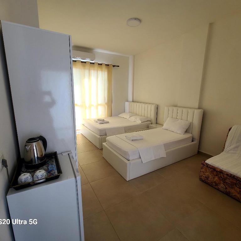 Postel nebo postele na pokoji v ubytování Arli Eris Rent rooms