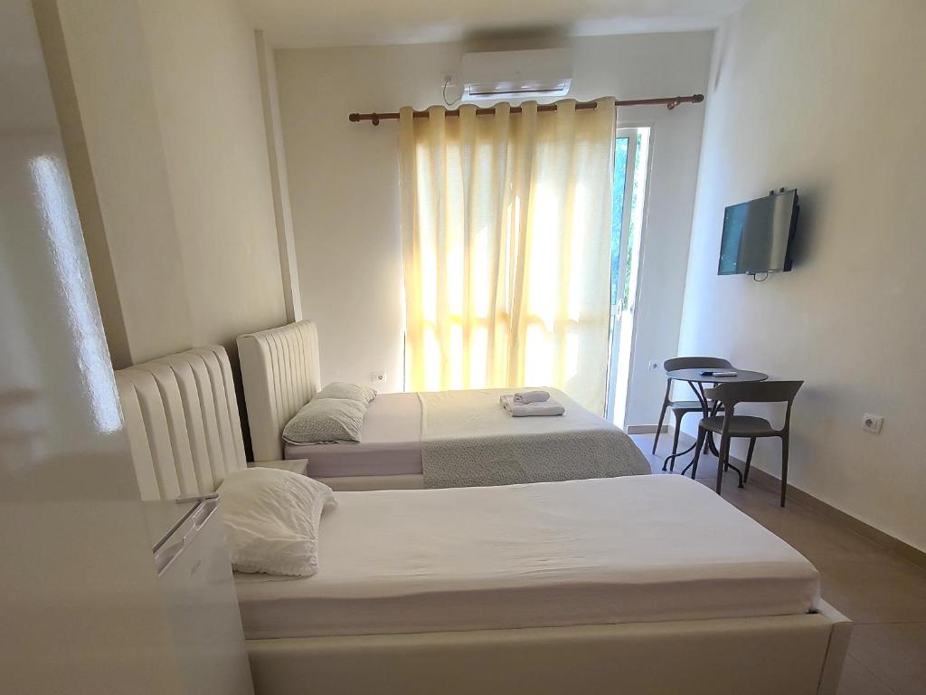 Postel nebo postele na pokoji v ubytování Arli Eris Rent rooms