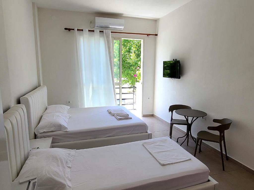 Postel nebo postele na pokoji v ubytování Arli Eris Rent rooms