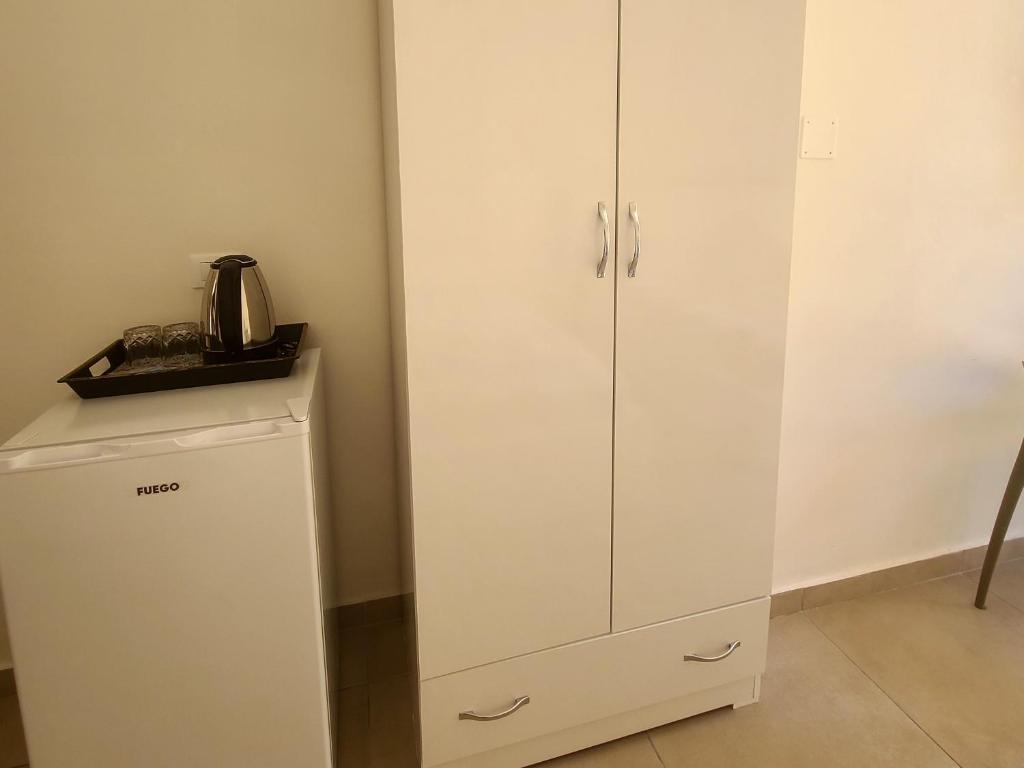 Kuchyň nebo kuchyňský kout v ubytování Arli Eris Rent rooms