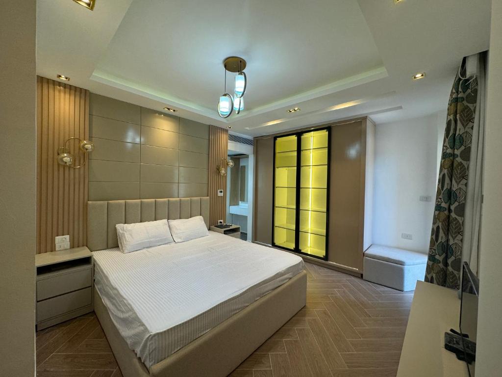 Postel nebo postele na pokoji v ubytování Luxury Smart Home- Villa Duplex