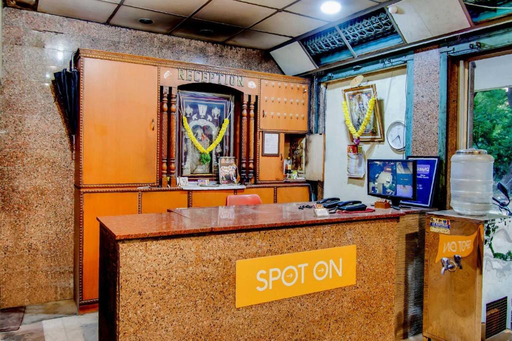 Certifikát, hodnocení, plakát nebo jiný dokument vystavený v ubytování Hotel O New Aiswarya