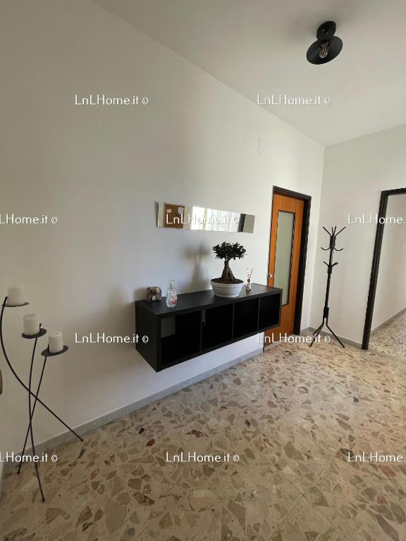 Postel nebo postele na pokoji v ubytování L&L Home - Augusta - Siracusa