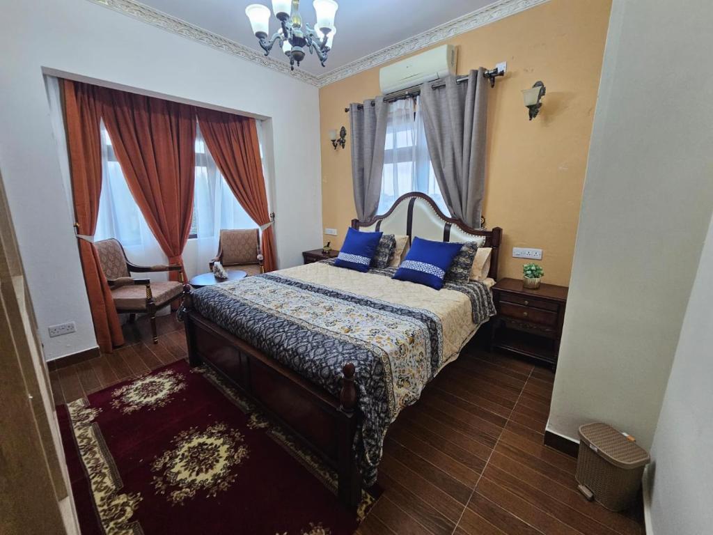 Postel nebo postele na pokoji v ubytování Blue Rawal
