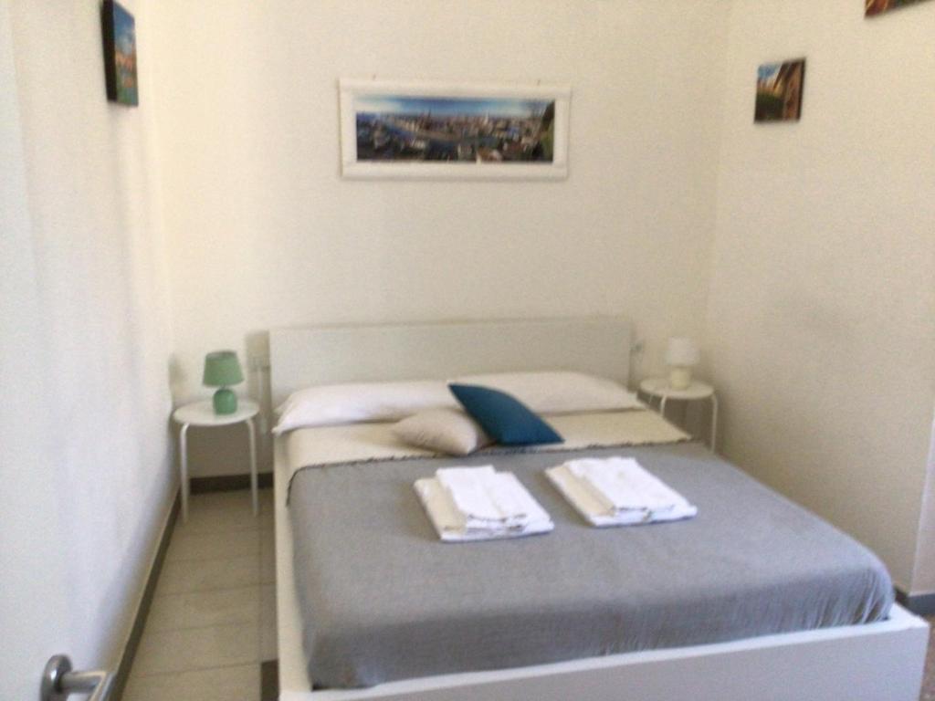 Posteľ alebo postele v izbe v ubytovaní A due passi da Giulietta-Casa Montecchi