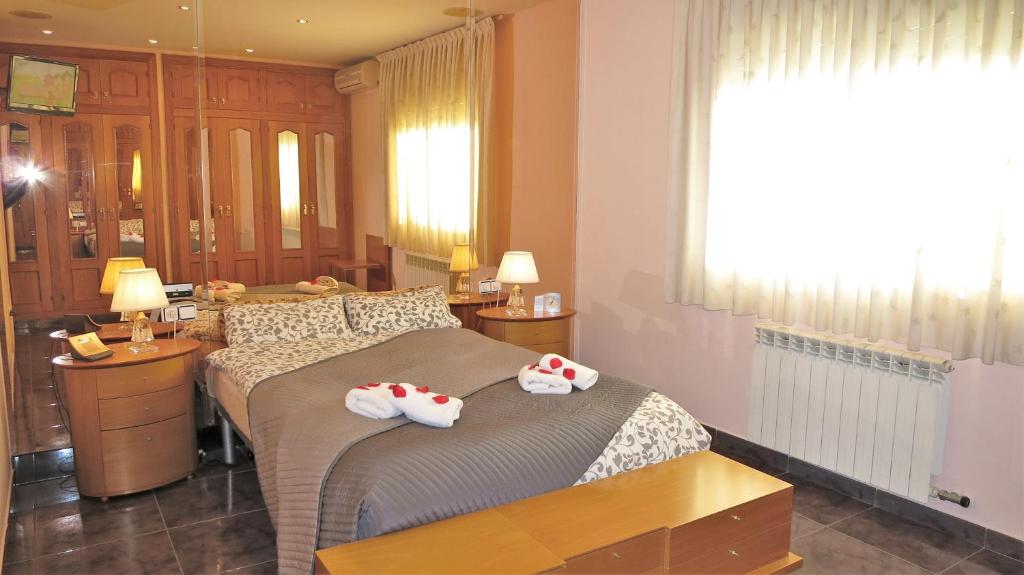 Postel nebo postele na pokoji v ubytování Villa Carolina