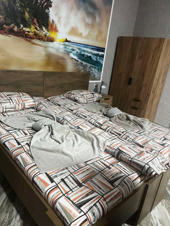 Postel nebo postele na pokoji v ubytování Арт 4