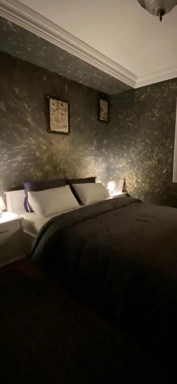 Postel nebo postele na pokoji v ubytování Nice appartement au centre de IFRANE