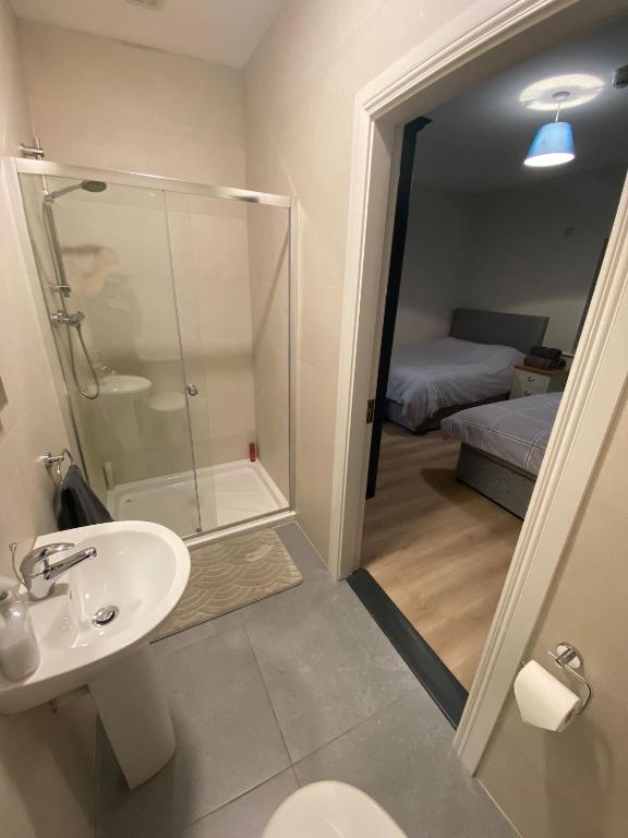 Koupelna v ubytování Dromod suites