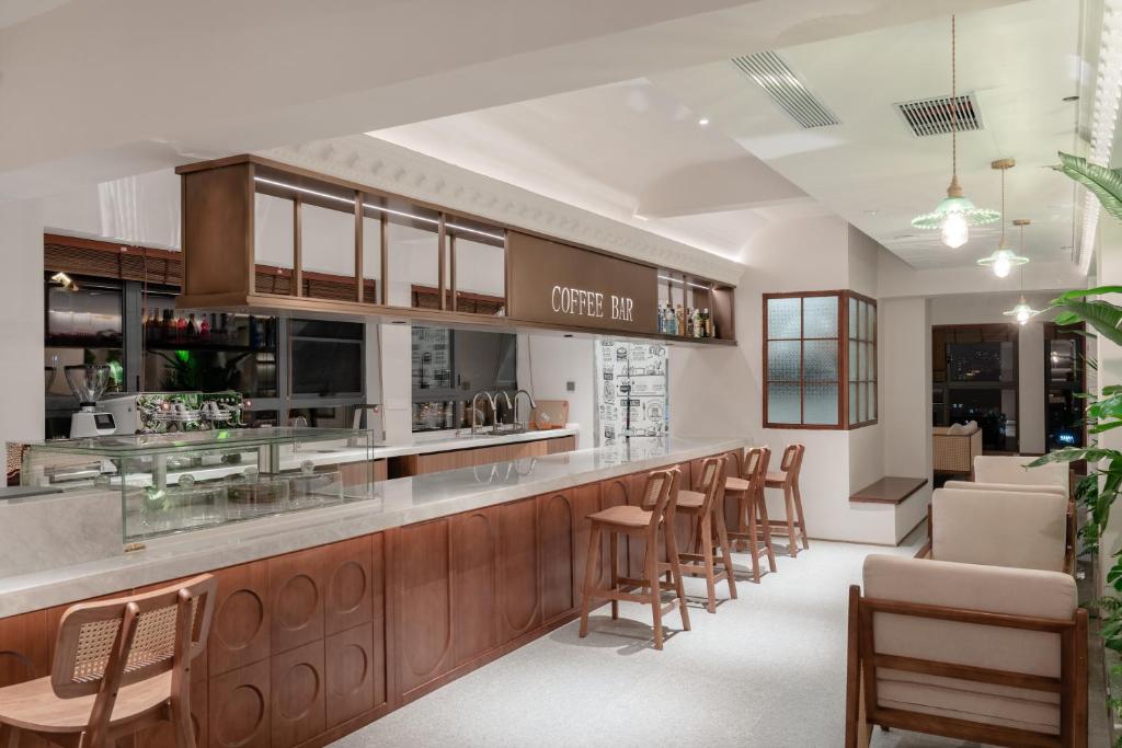 Posezení v ubytování 昆明市呈贡区椿屿岚酒店 Chun Yulan Hotel