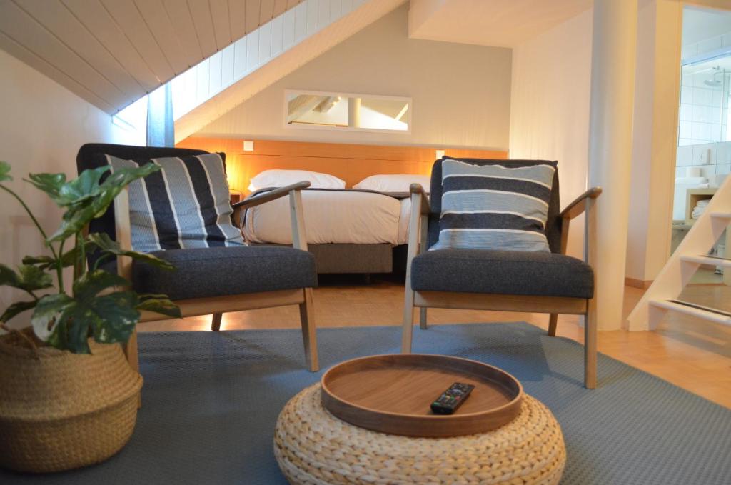 Postel nebo postele na pokoji v ubytování Hotel des Alpes