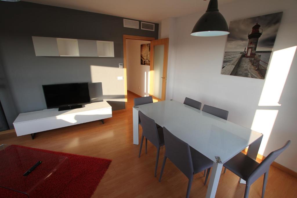 Televízia a/alebo spoločenská miestnosť v ubytovaní For a Stay Las Dunas