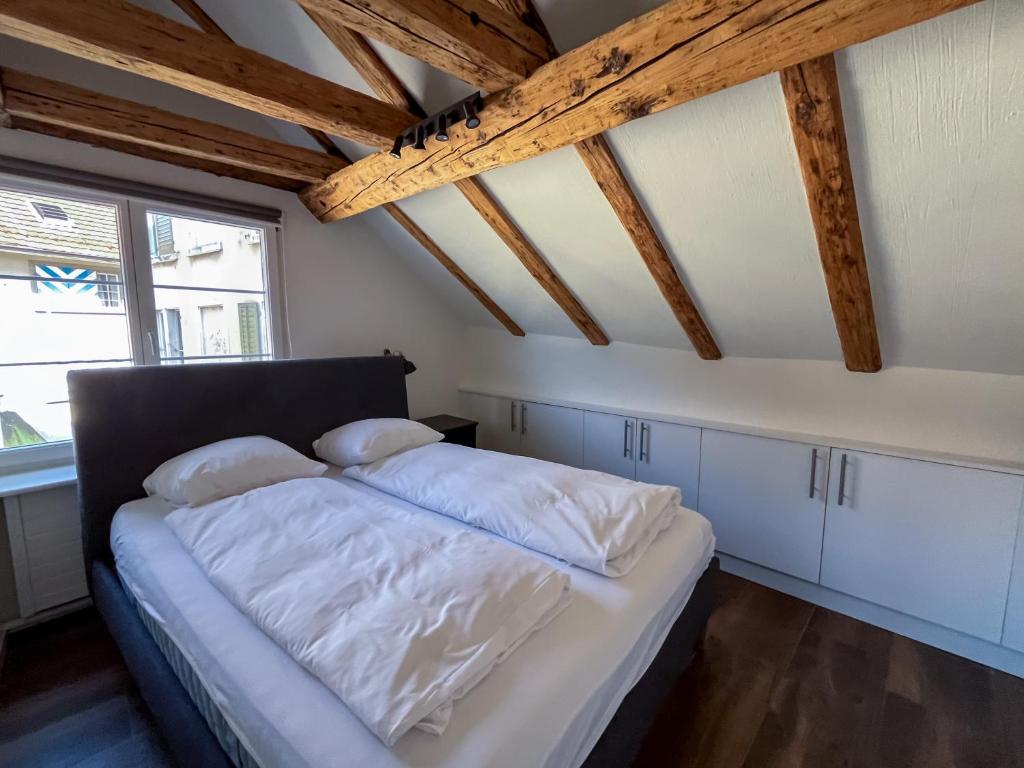 Uma cama ou camas num quarto em stattHotel