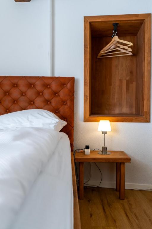 Uma cama ou camas num quarto em stattHotel