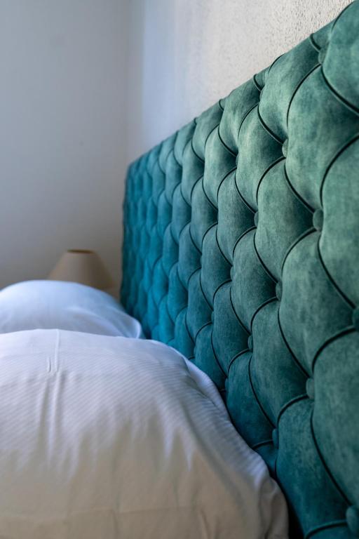 Uma cama ou camas num quarto em stattHotel