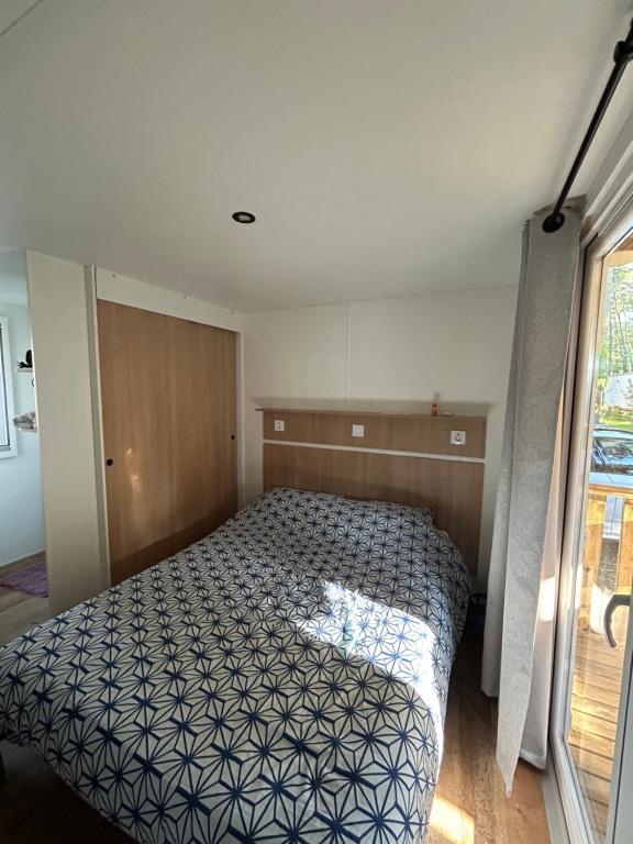 Postel nebo postele na pokoji v ubytování Mobilhome dans les Pins