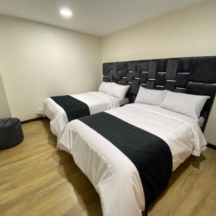 Postel nebo postele na pokoji v ubytování Hotel Danevi