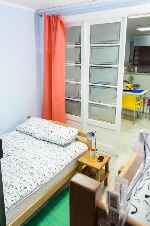 Postel nebo postele na pokoji v ubytování Hostel White Town