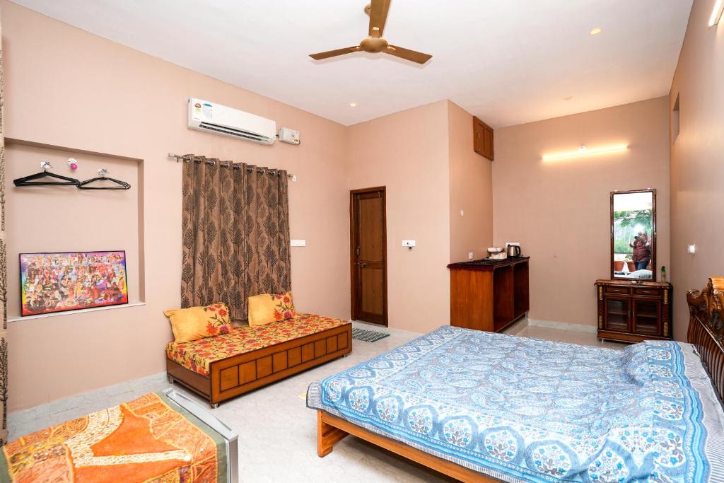 Postel nebo postele na pokoji v ubytování Pushkar Cooking Art and Home Stay