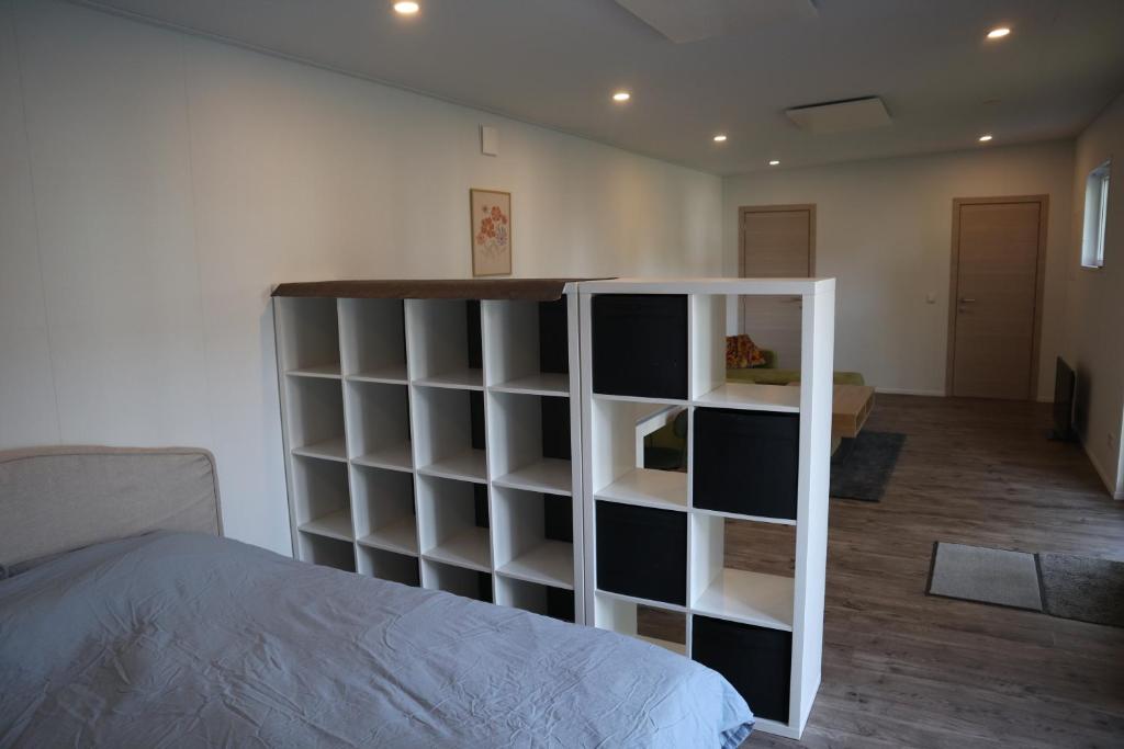 Postel nebo postele na pokoji v ubytování Tinyhouse