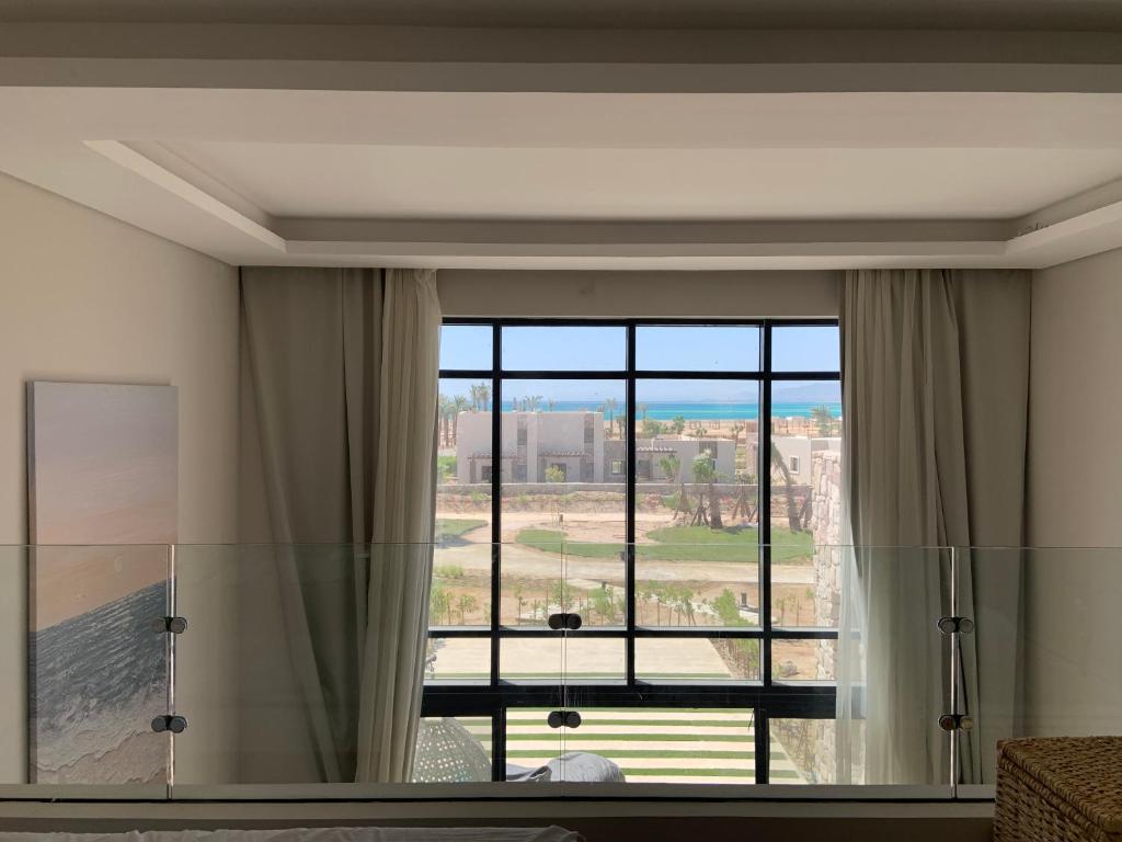 Fotografie z fotogalerie ubytování Cozy 2BR Seaview loft in Mesca Somabay v destinaci Hurghada