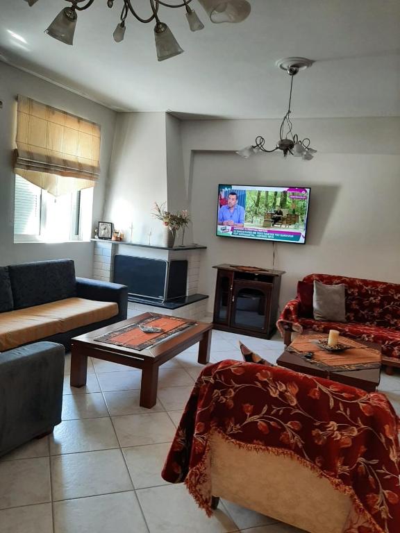 Televízia a/alebo spoločenská miestnosť v ubytovaní beautiful apartment near the beach