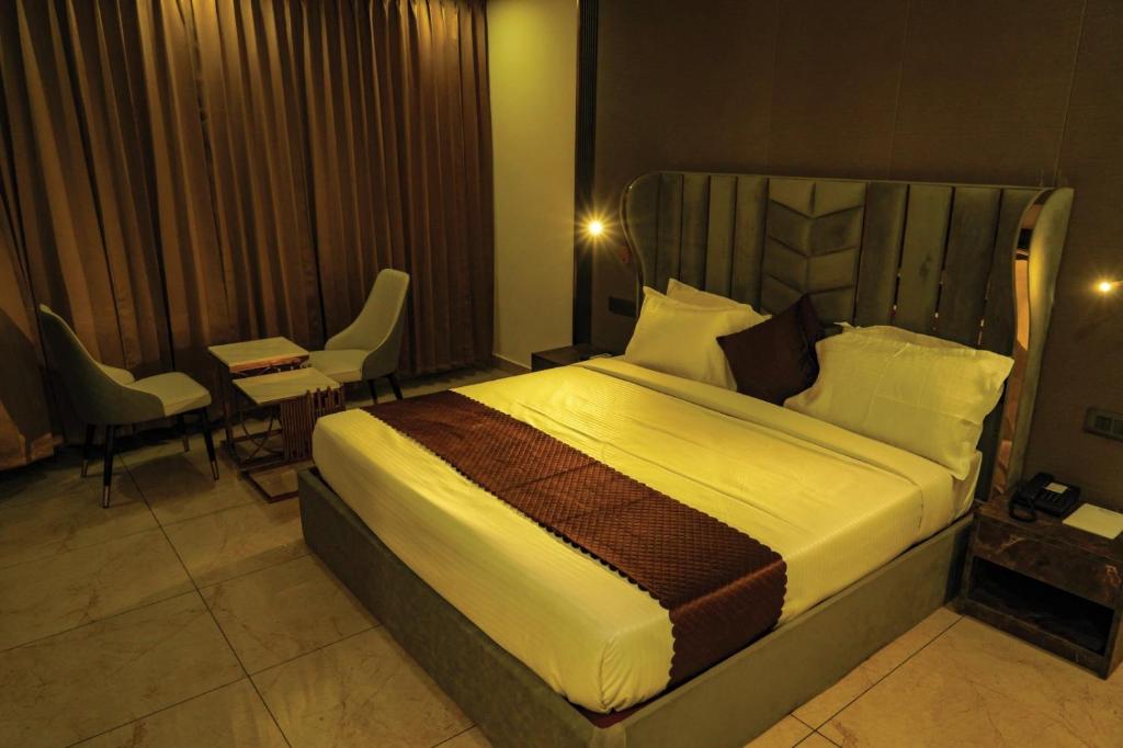 Postel nebo postele na pokoji v ubytování BINI Heritage