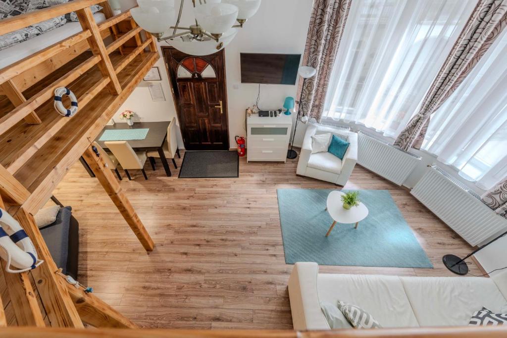 an overhead view of a living room and dining room at Mirage Apartments Váci Street in Budapest
