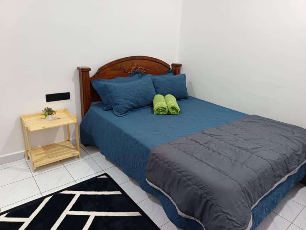 Postel nebo postele na pokoji v ubytování IRDINA GUESTHOUSE