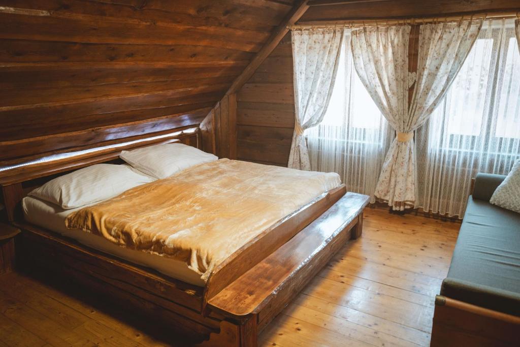 Postel nebo postele na pokoji v ubytování Penzion Sklípek