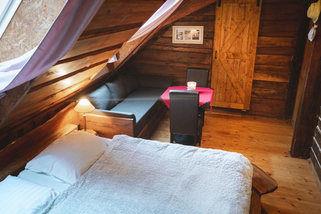 Postel nebo postele na pokoji v ubytování Penzion Sklípek