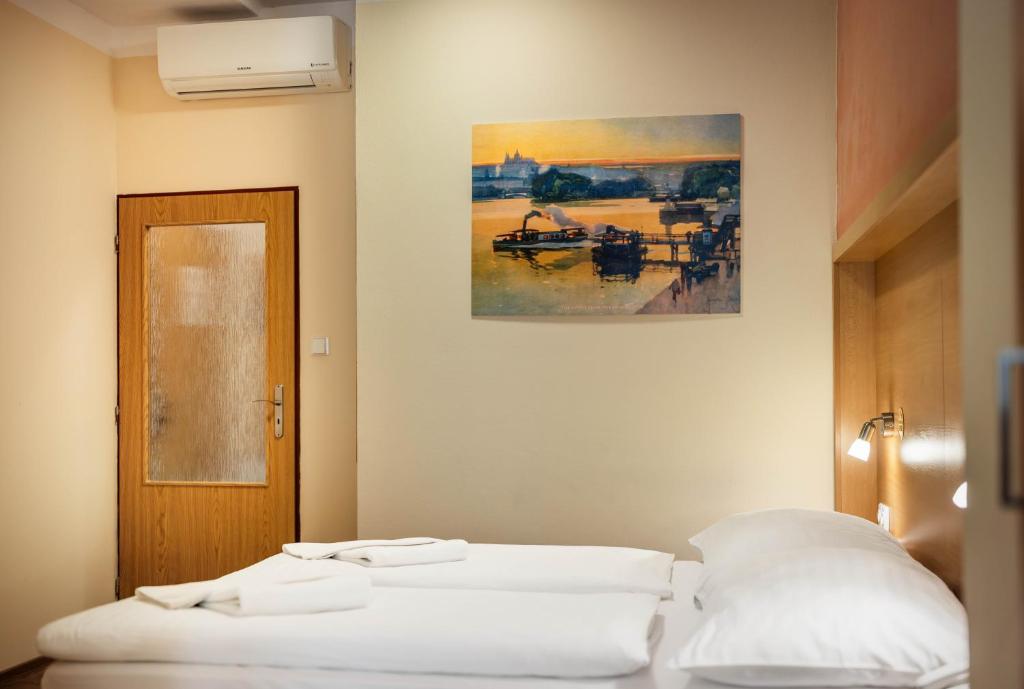 Postel nebo postele na pokoji v ubytování Residence BENE