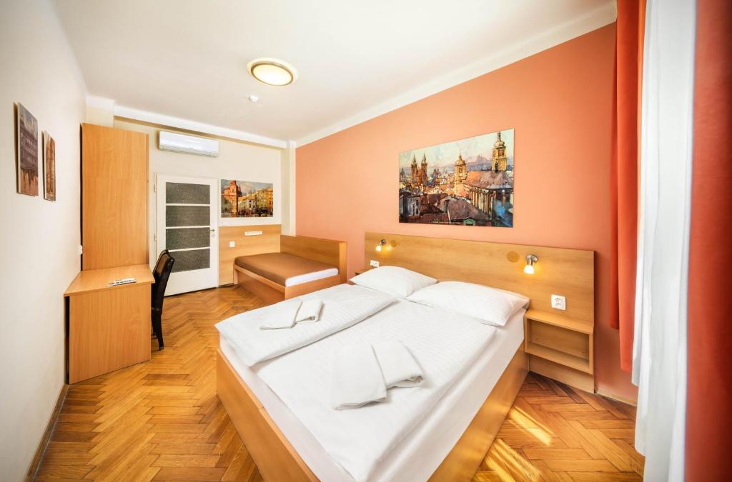 Postel nebo postele na pokoji v ubytování Residence BENE
